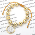 Pulsera de Bolas Doradas con Medalla de la Virgen