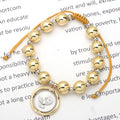 Pulsera de Bolas Doradas con Medalla del Espíritu Santo