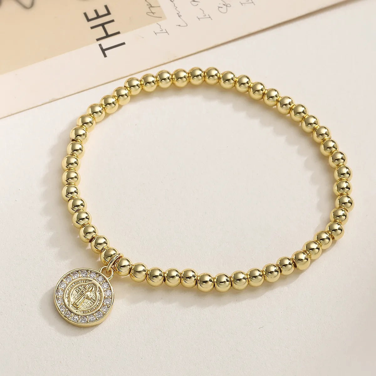 Pulsera de Bolitas con Medalla de San Benito