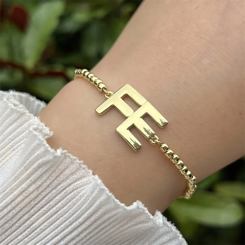 Pulsera Palabra FE en Tono Dorado